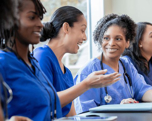 Nurses discussing patient care