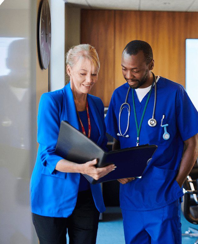 Doctors discussing patient files
