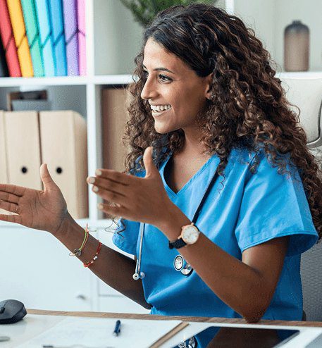 Medical professional consulting at a desk